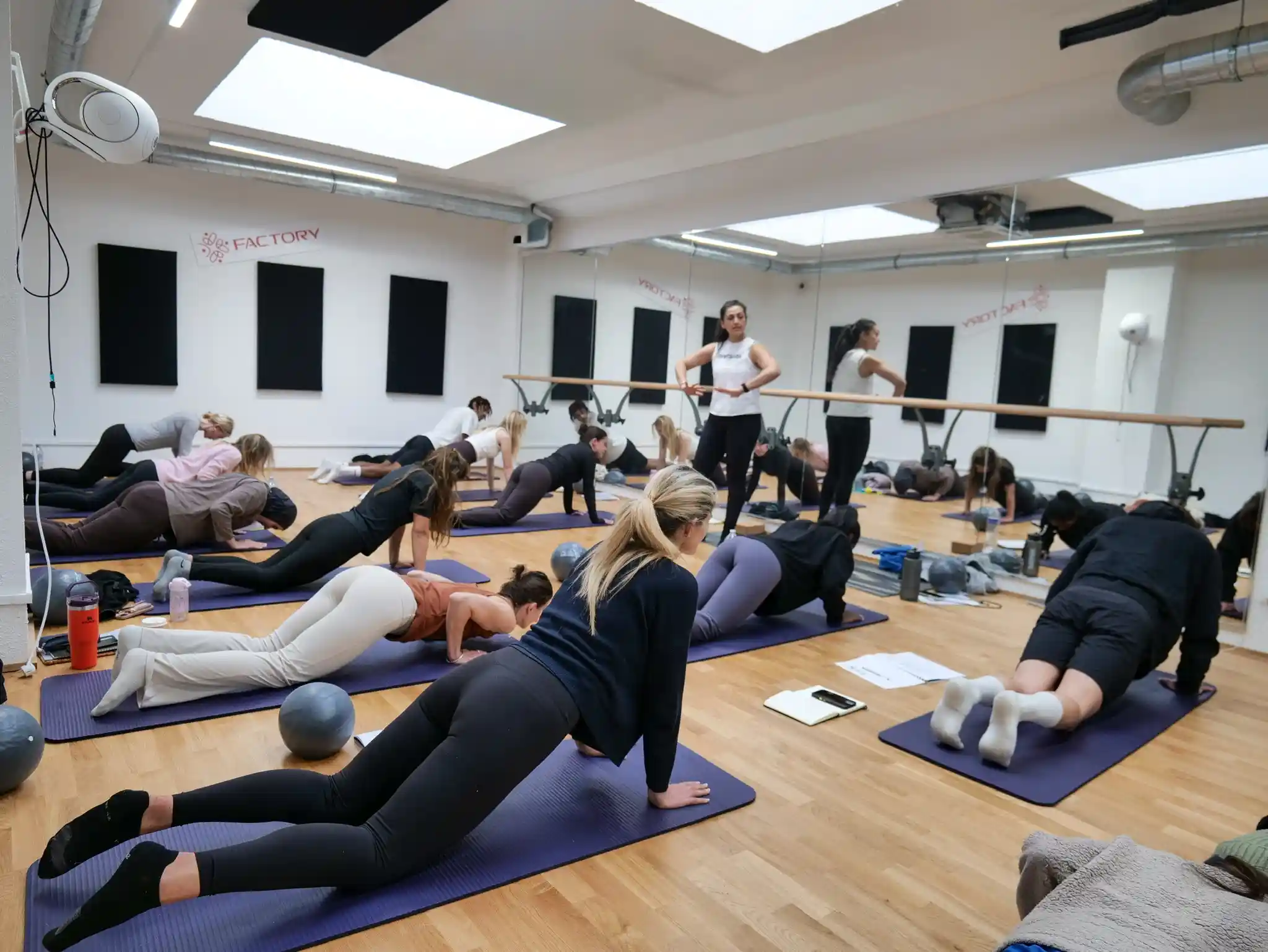 Group Pilates Instructor Course in a professional training studio in London
